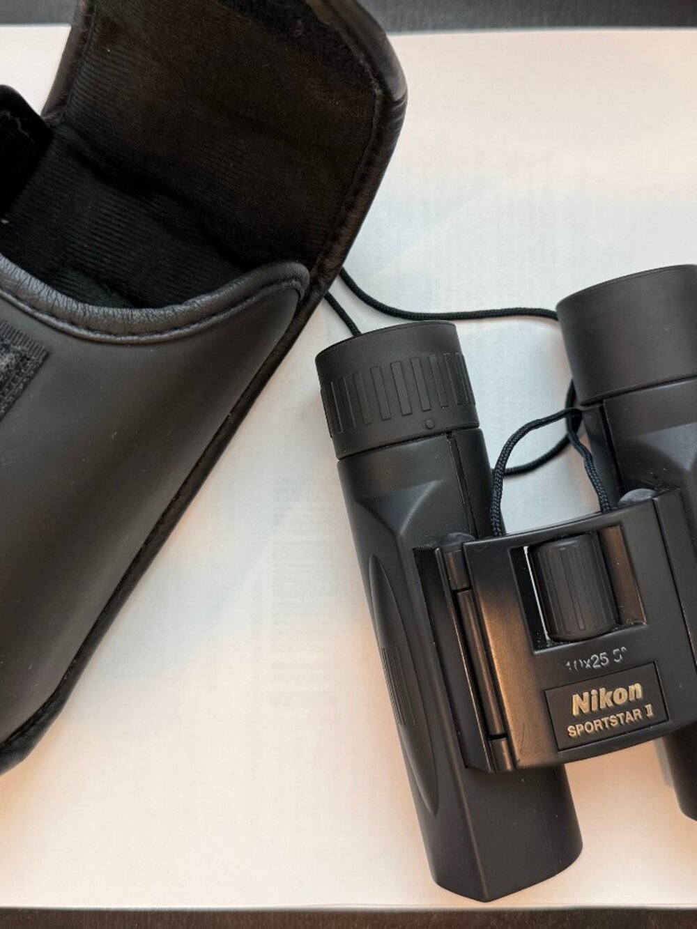Nikon Sportstar EX 10x25DCF binoculars in open box